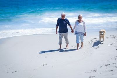retired couple on beach